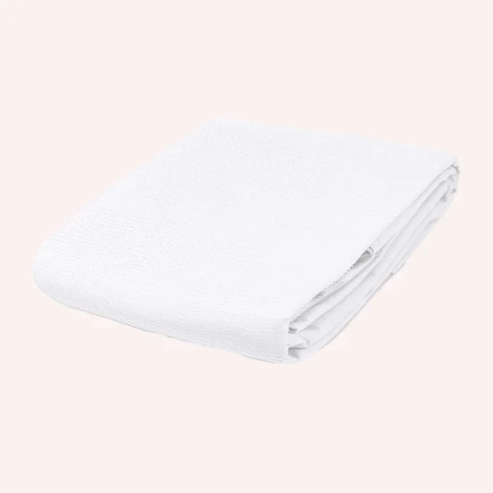 BabyRest Waterproof Cot Mattress Protector (package)