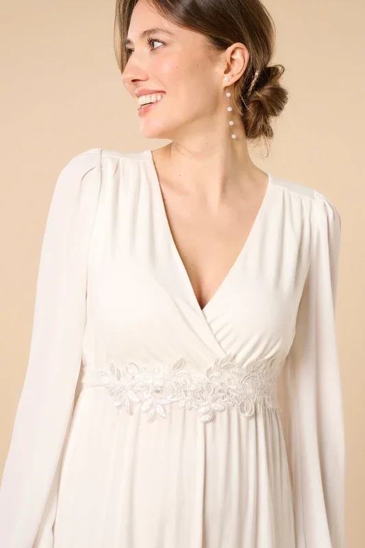 Boho wedding dress with satin sash and floral lace