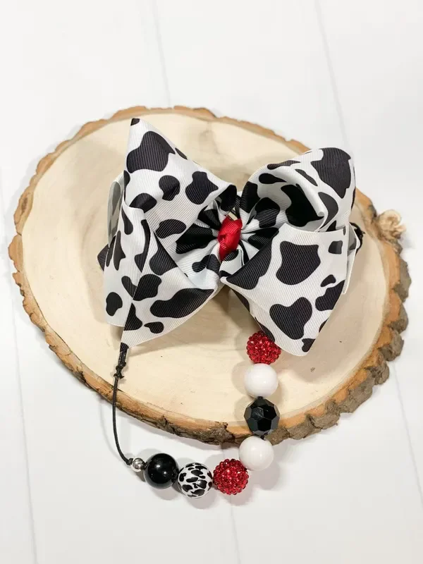 Cow Print Texas Size Knot Hair Bow – Red Center