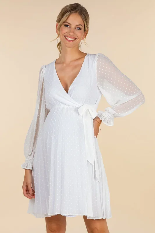 Maternity wedding dress in a wrap style with a pleated skirt