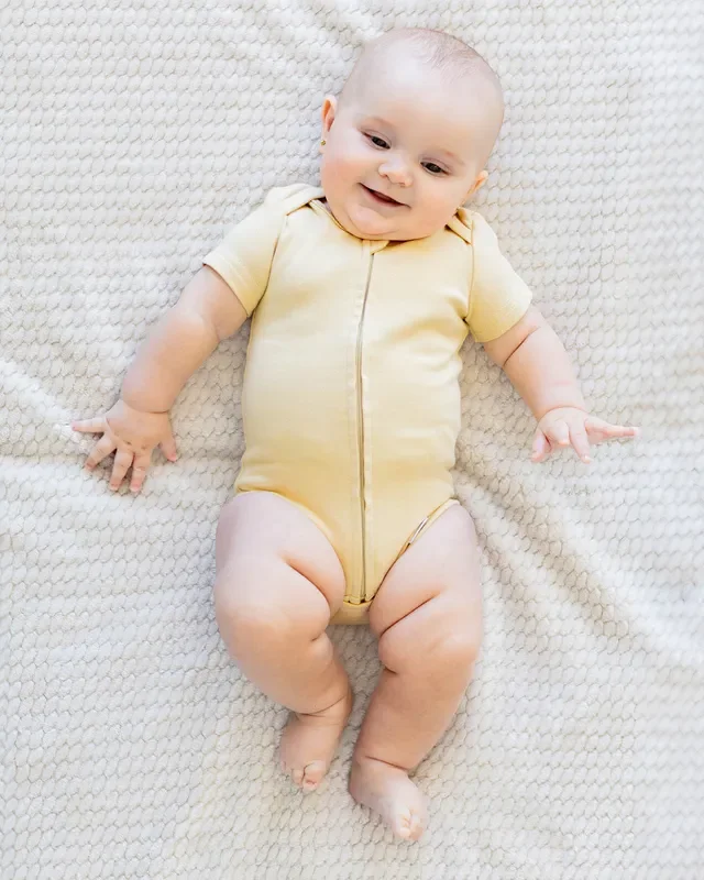 Short Sleeve Zipper Bodysuit In Latte, 0-3m